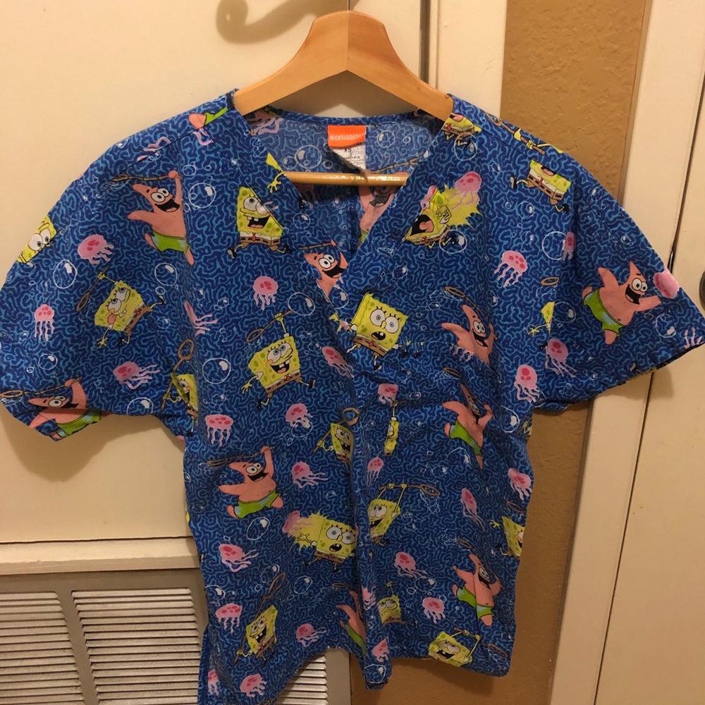 Nurse cartoon scrub top size XS
